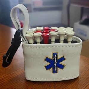 EMS "star of life" golf tee holder clip